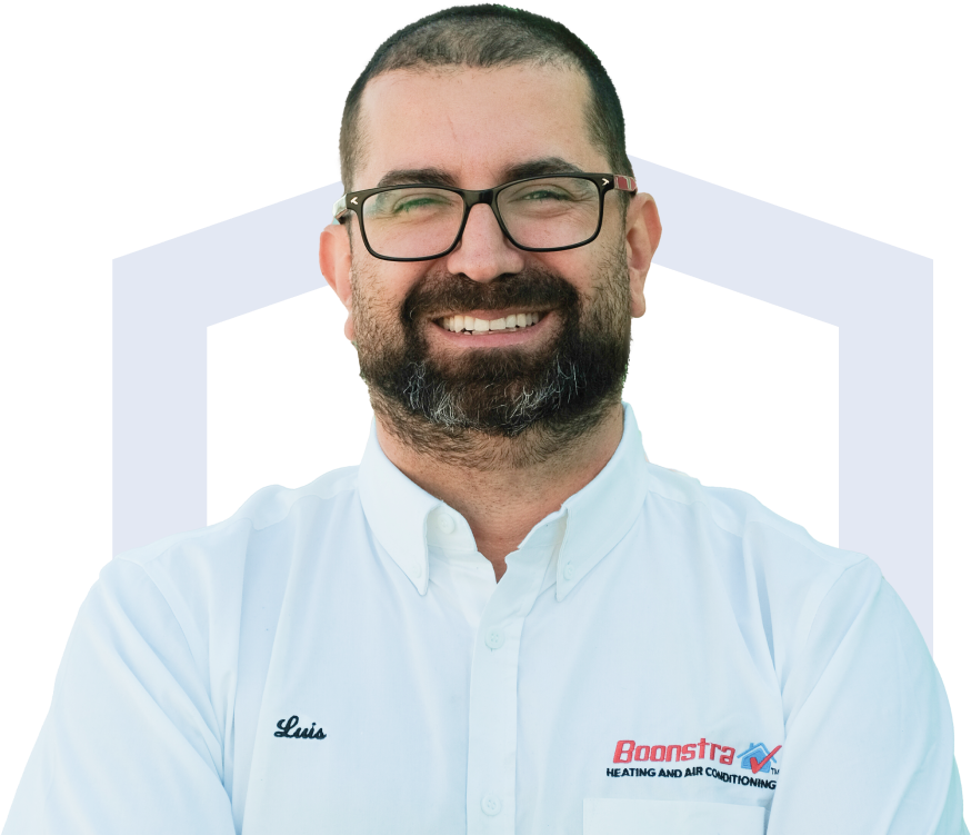 Boonstra team member in his white uniform, smiling broadly with teeth visible.